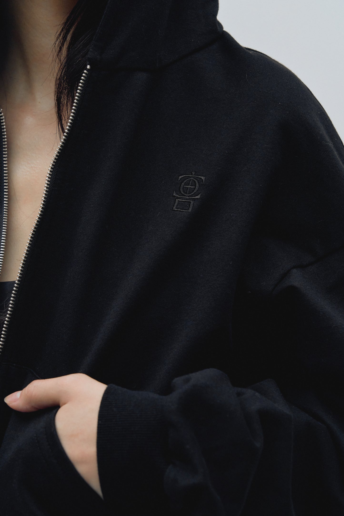 The Cropped Zip in Black